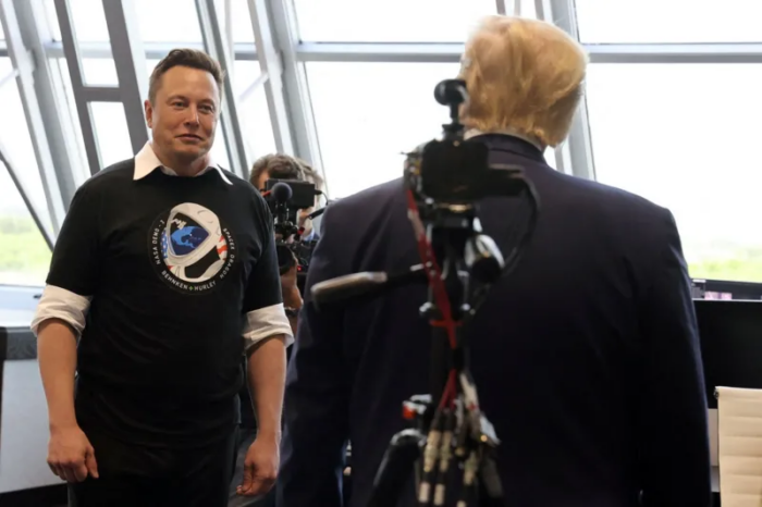 Trump and Musk meet at Nasa's Kennedy Space Center in Florida after the launch of a SpaceX Falcon 9 rocket in May 2020